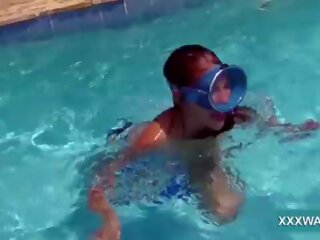 Extraordinary brunette slut candy swims underwater